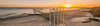 die maritim Seebrücke in Form eines Lassos im Sonnenuntergang