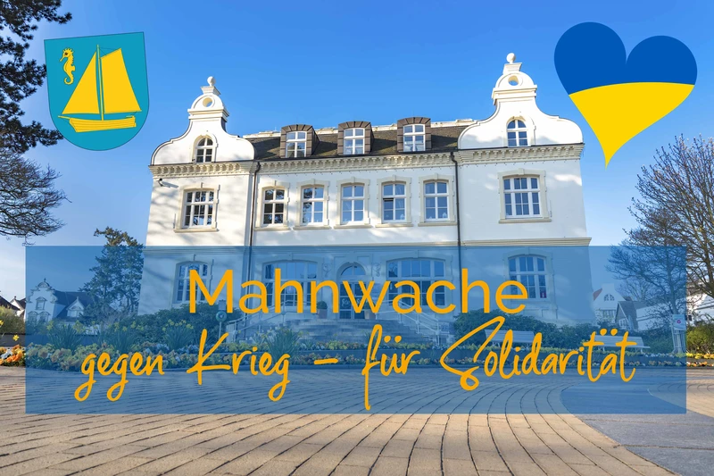 Foto eines Gebäudes mit drübergelegter Schrift Mahnwache gegen Krieg für Solidarität. In der oberen rechten Ecke ein Herz in den Farben der Ukraine.