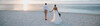 Hochzeitspärchen am Strand bei Sonnenuntergang